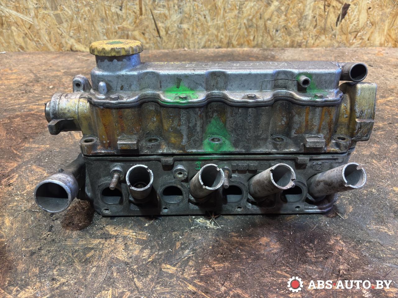 головка блока цилиндров Opel Corsa B 2000, 1.2 л., бензин, X12SZ, 81228 - фото №1