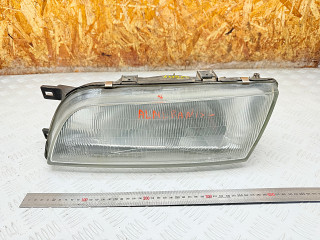 фара левая Nissan Almera N15 1996