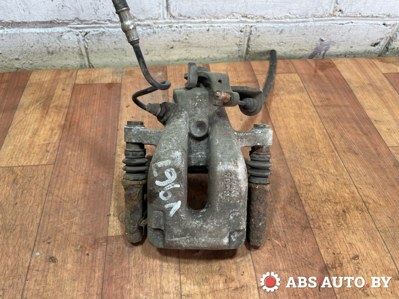 суппорт задний левый Citroen C4 1 поколение 2006, 1.6 л., бензин, МКПП, 1091564 - фото №1