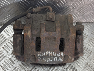 суппорт передний правый Kia Carnival 1 поколение [рестайлинг] 2004, 2.9 л.