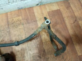 суппорт передний левый Nissan Primera P12 (2001 - 2008), 2.2 л., дизель, МКПП, универсал, 249541