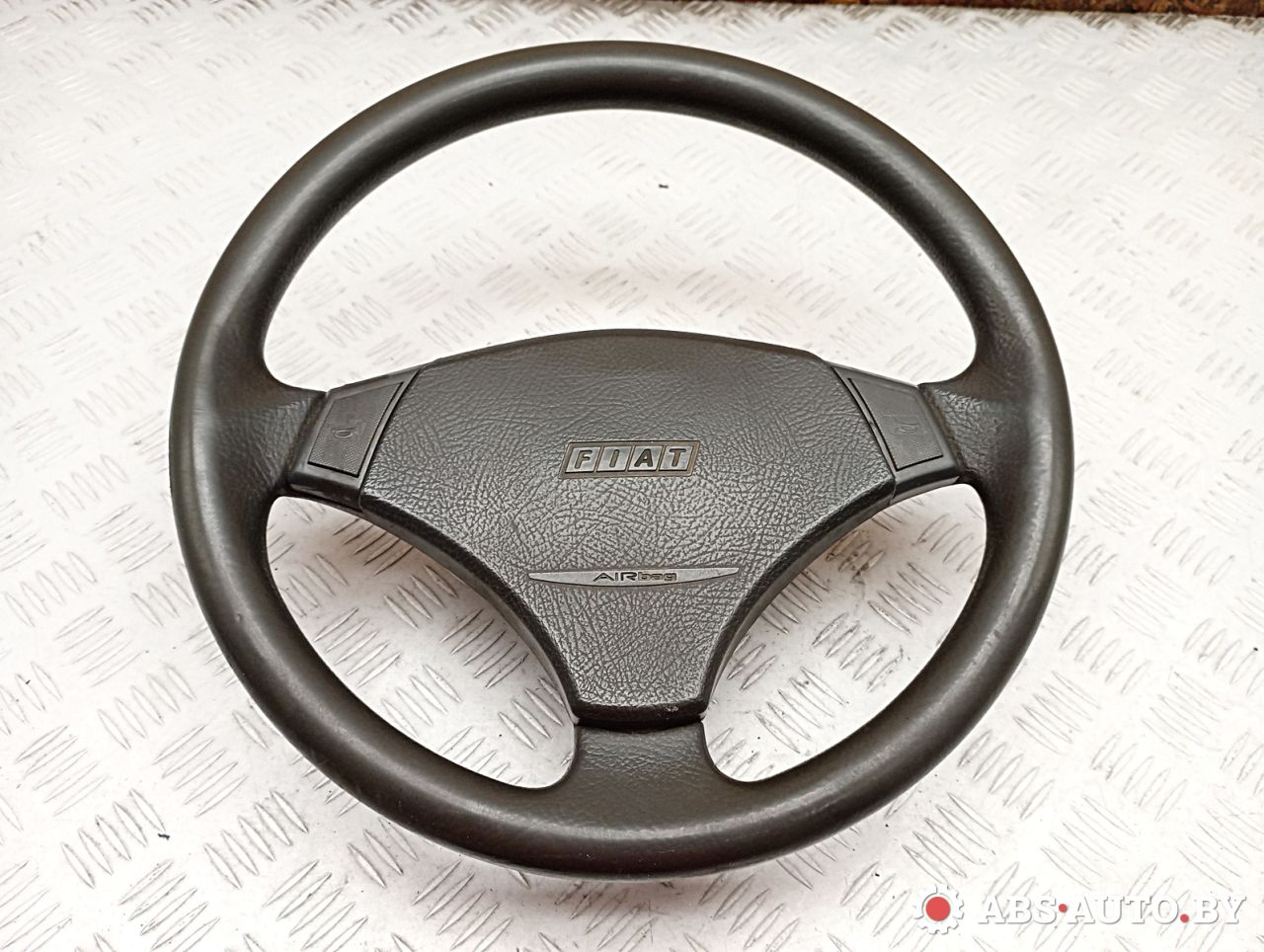 руль Fiat Punto 1 поколение 1998, 1.2 л., бензин, МКПП, хетчбэк 3 дв. - фото №1