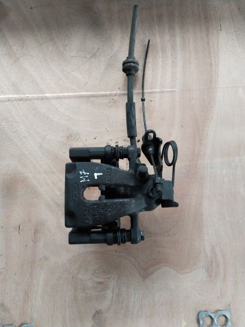 суппорт задний левый Dacia Logan 2 поколение 2013, 0.9 л., H4B 400, бензин, универсал - фото №1