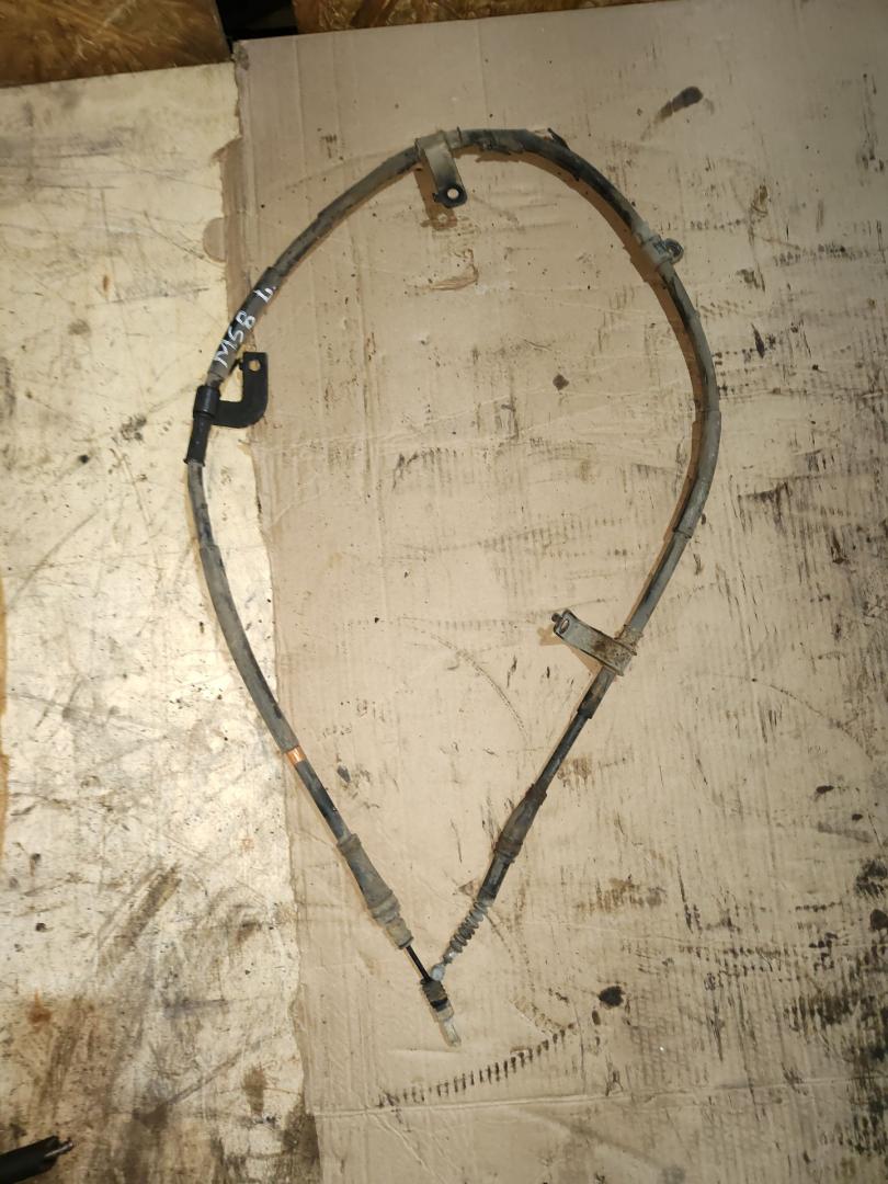 трос ручника Hyundai Santa Fe 2 поколение (CM) 2007, 2.2 л., D4EB, дизель, АКПП - фото №1