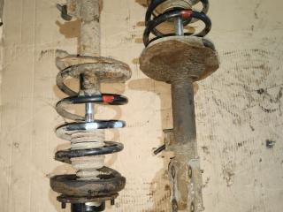 стойка передняя левая Nissan X-Trail T30 2001, 2.2 л., YD22D, дизель