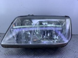фара левая Volkswagen Bora 1 поколение 1J2 (1998 - 2005), черный, седан, передний привод