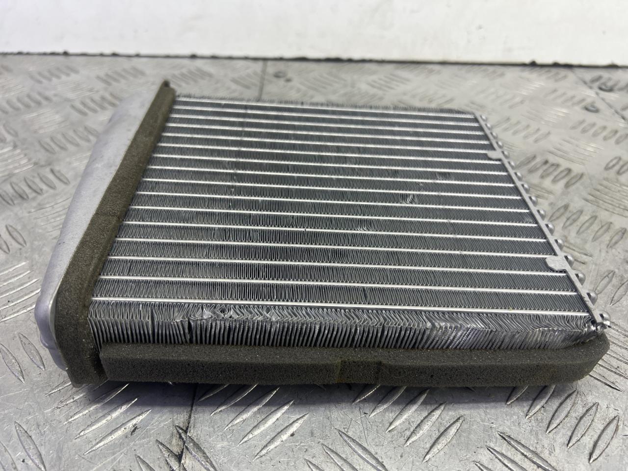 радиатор отопителя (печки) Volkswagen Golf 6 поколение 2012, 2.0 л., CCZB, бензин, АКПП, белый, кабриолет, передний привод, 1K0819031E - фото №1