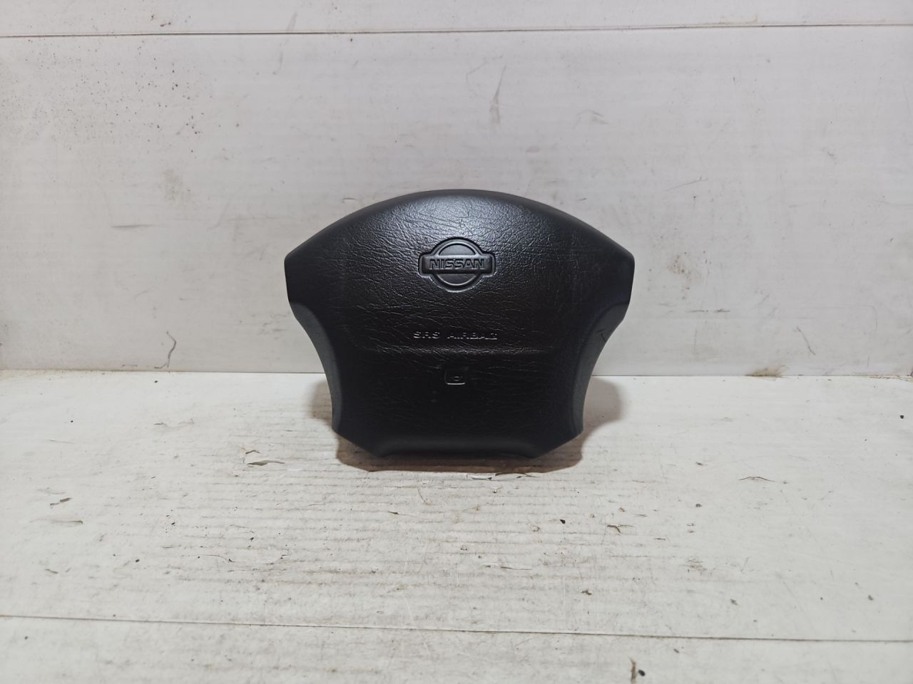 подушка безопасности водителя Nissan Micra 2 поколение (K11) 1997, 1.0 л., CG10DE, бензин, МКПП, хетчбэк 3 дв., передний привод - фото №1