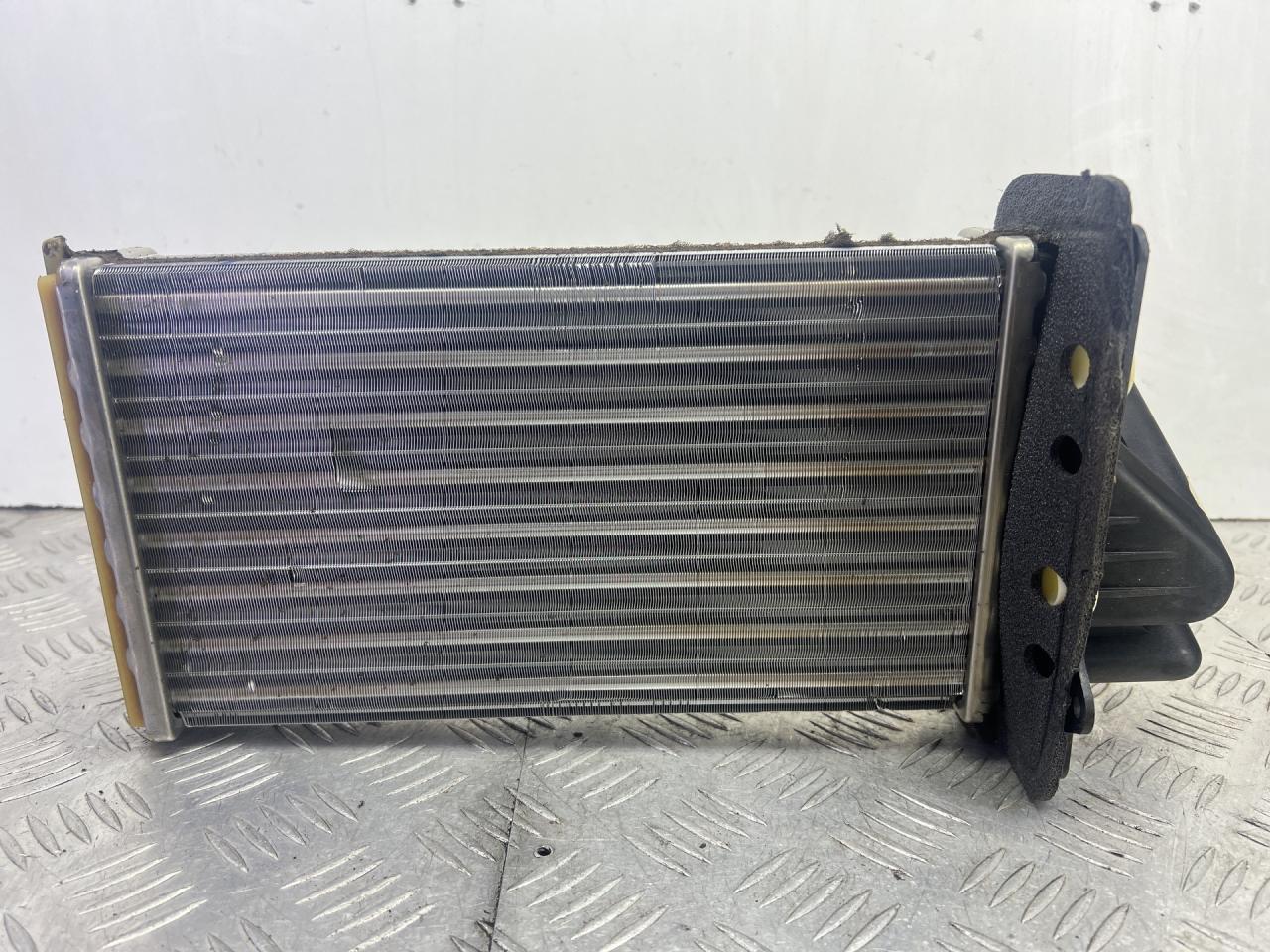 радиатор отопителя (печки) Volkswagen Golf 6 поколение 2012, 2.0 л., CCZB, бензин, АКПП, белый, кабриолет, передний привод - фото №1