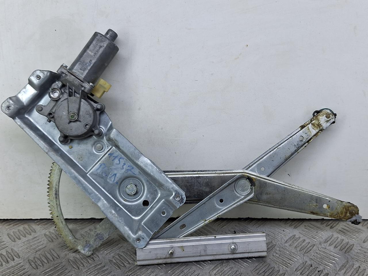 стеклоподъемник передний левый Saab 9-3 1 поколение 2001, 2.0 л., B205E, бензин, АКПП, черный, хетчбэк 5 дв., передний привод, 0130821662 - фото №1