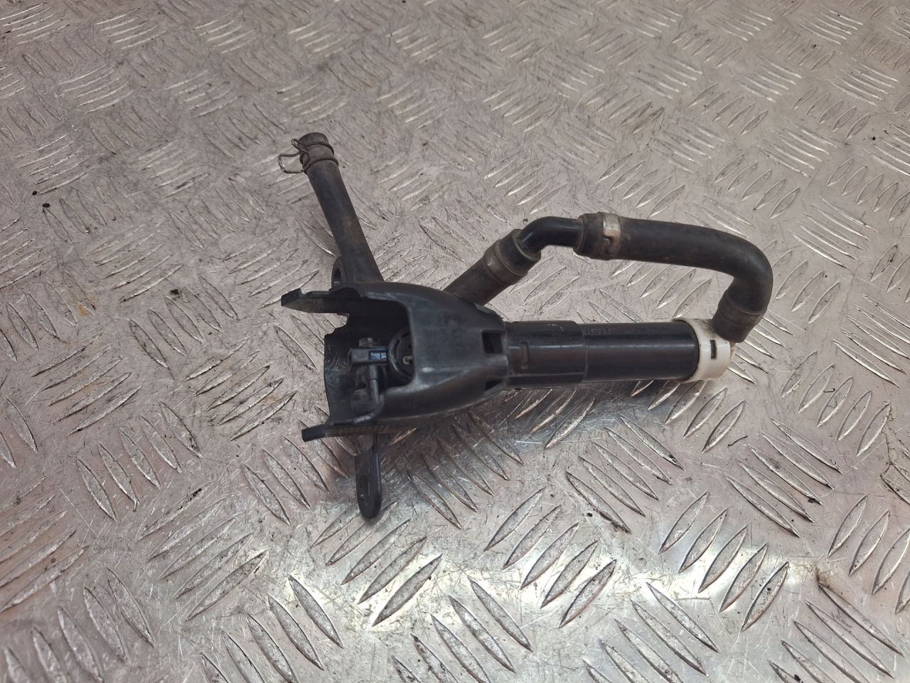 форсунка омывателя фары правая Mitsubishi Outlander 2 поколение (2005 - 2010), 87871 - фото №1