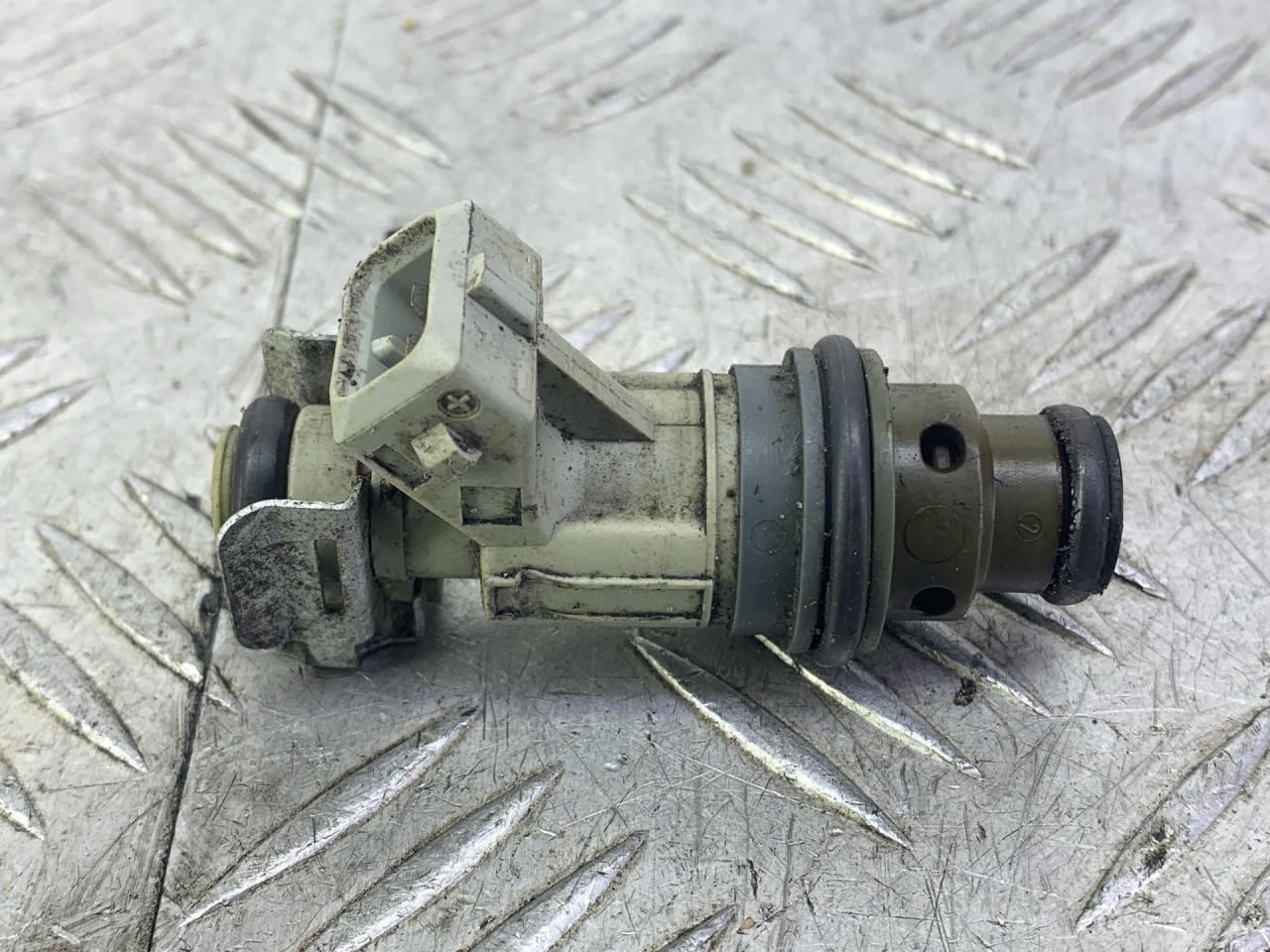 форсунка Opel Astra G 1999, 1.2 л., X 12 XE, бензин, МКПП, зеленый, универсал, задний привод, 0280155793 - фото №1