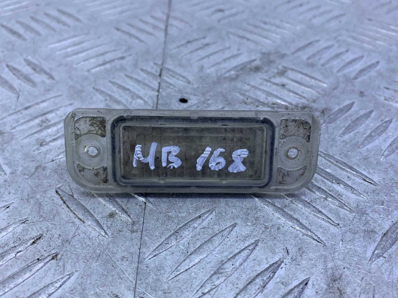 подсветка номера Mercedes-Benz A-Класс W168 2001, 1.7 л., OM 668.942, дизель, МКПП, темно-зеленый, хетчбэк 5 дв., передний привод, 1688200256 - фото №1