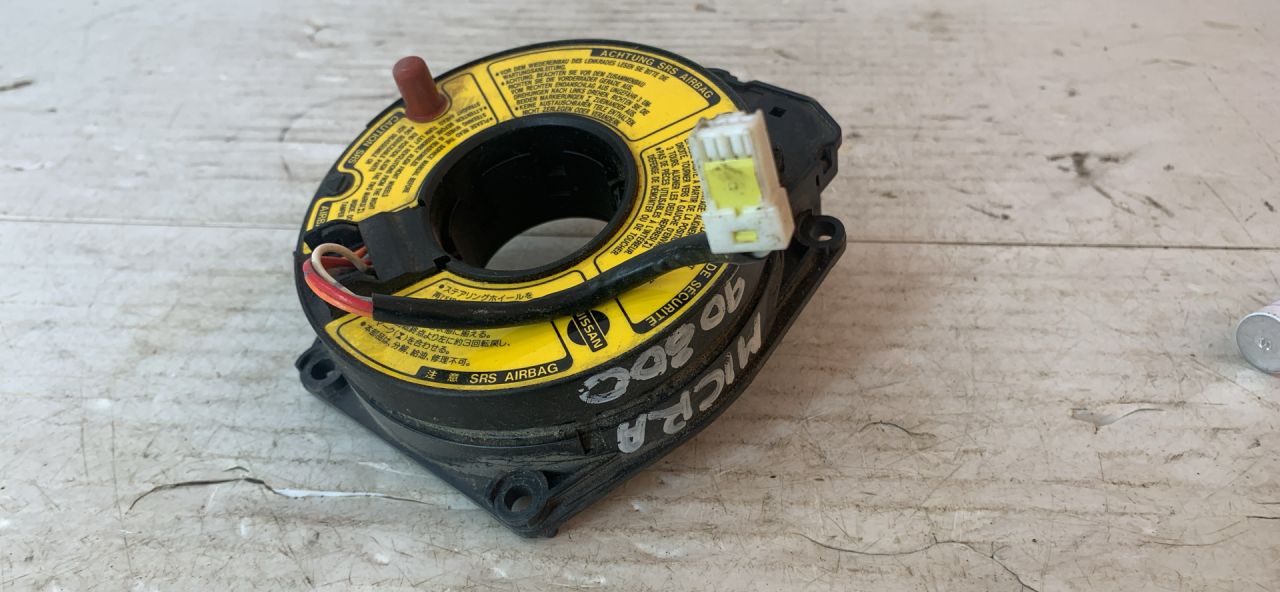 шлейф руля Nissan Micra 2 поколение (K11) 1997, 1.0 л., CG10DE, бензин, МКПП, хетчбэк 3 дв., передний привод, 255545F600 - фото №1