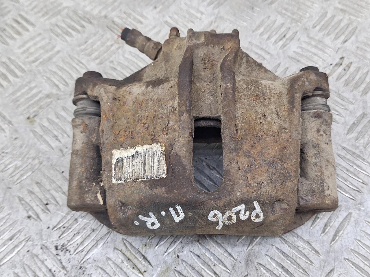 суппорт передний правый Peugeot 206 1 поколение 2000 - фото №1