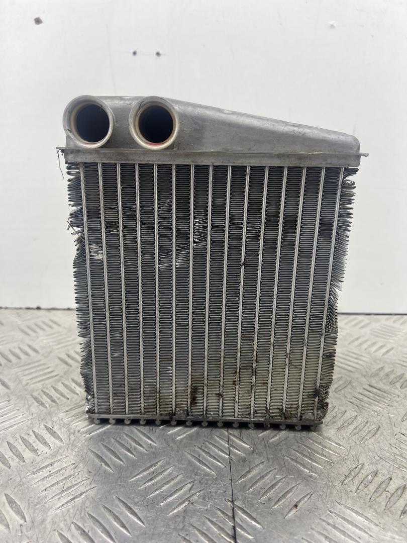 радиатор отопителя (печки) Renault Clio 3 поколение 2007, 1.2 л., D4F 740, бензин, МКПП, хетчбэк 3 дв., передний привод - фото №1