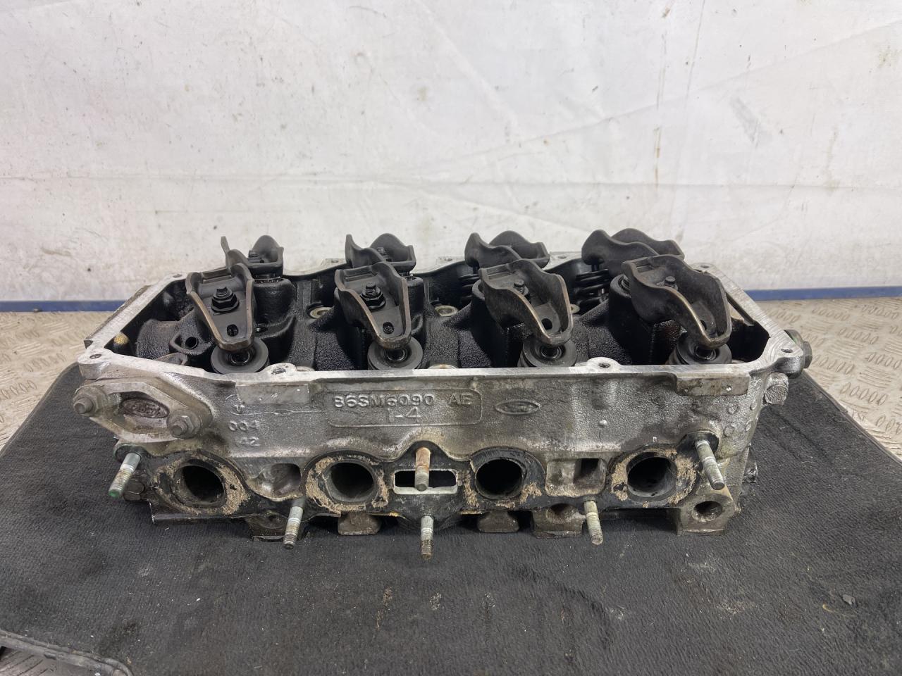 головка блока цилиндров Ford Escort 4 поколение (1986 - 1990), 1.4 л., F6C, бензин, передний привод, 965M6090 - фото №1