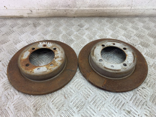 диск тормозной задний Mitsubishi Carisma 1 поколение [рестайлинг] 2003, 1.6 л., 4G92 (DOHC 16V), бензин, МКПП, серебро, хетчбэк 5 дв., передний привод