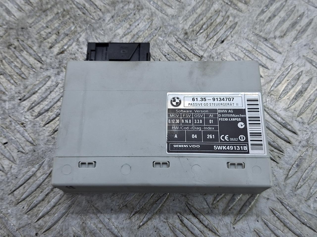 Блок управления бесключевым доступом BMW X6 E71/E72 E71 (2007 - 2012), 4.4 л., N63 B44 A, бензин, АКПП, внедорожник 5 дв., полный привод, 61359134707, 5WK49131B - фото №1