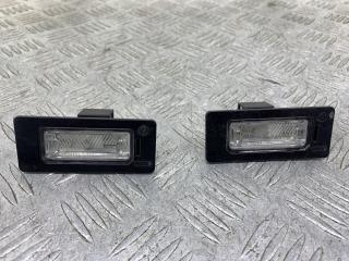 подсветка номера Volkswagen Passat B6 2009, 1.4 л., CAXA, бензин, 6МКПП, голубой, универсал, передний привод, 8T0943021