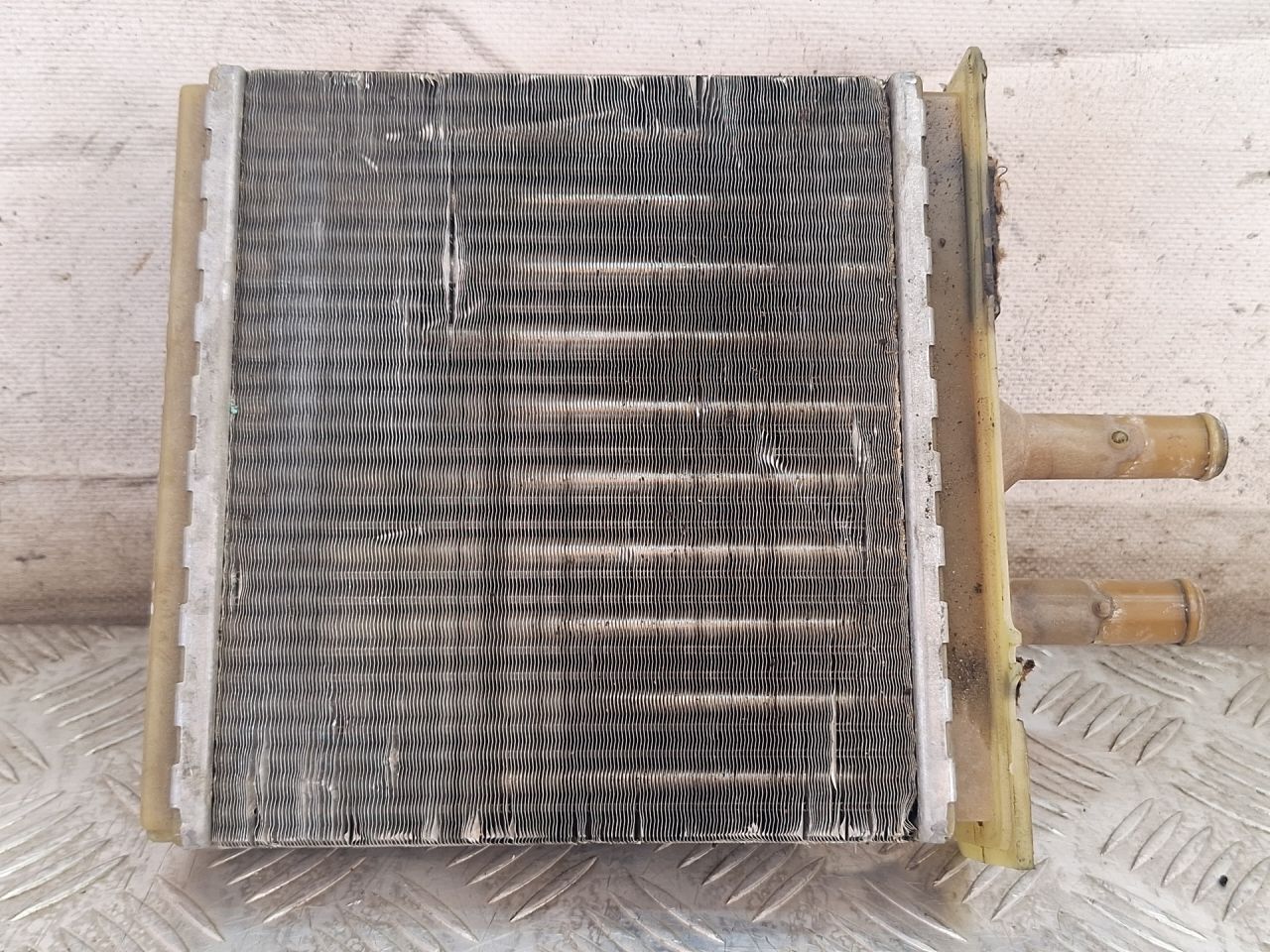 радиатор отопителя (печки) Lancia Ypsilon 1 поколение 2000, 1.6 л., бензин, МКПП, черный, хетчбэк 3 дв., передний привод - фото №1