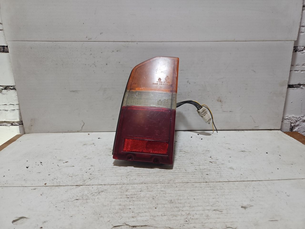 фонарь задний левый Suzuki Vitara 1 поколение 1993, 2.0 л., J20A, бензин, МКПП, кабриолет, полный привод, 22032224 - фото №1