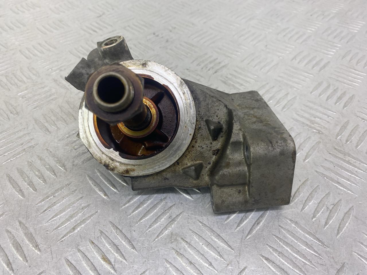 кронштейн масляного фильтра Volkswagen Passat B5 1999, 1.8 л., APT, бензин, 5МКПП, зеленый, универсал, передний привод, 055115417 - фото №1