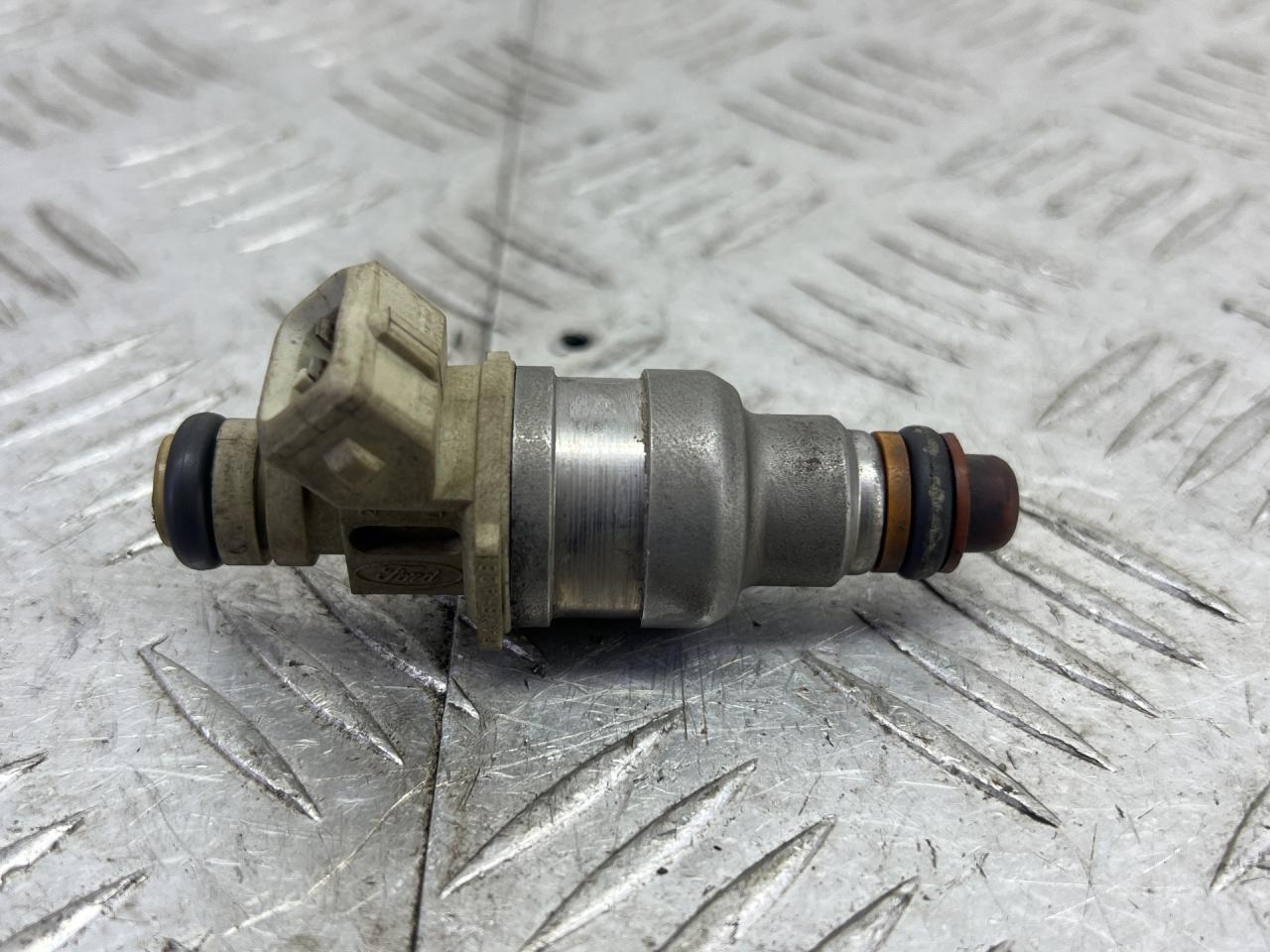 форсунка Ford Windstar 1 поколение (1995 - 1999), 3.0 л., бензин, F47EA2E - фото №1