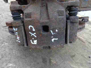 суппорт задний левый Mazda CX-9 1 поколение 2009, 3.7 л., i, бензин, АКПП, внедорожник 5 дв., полный привод