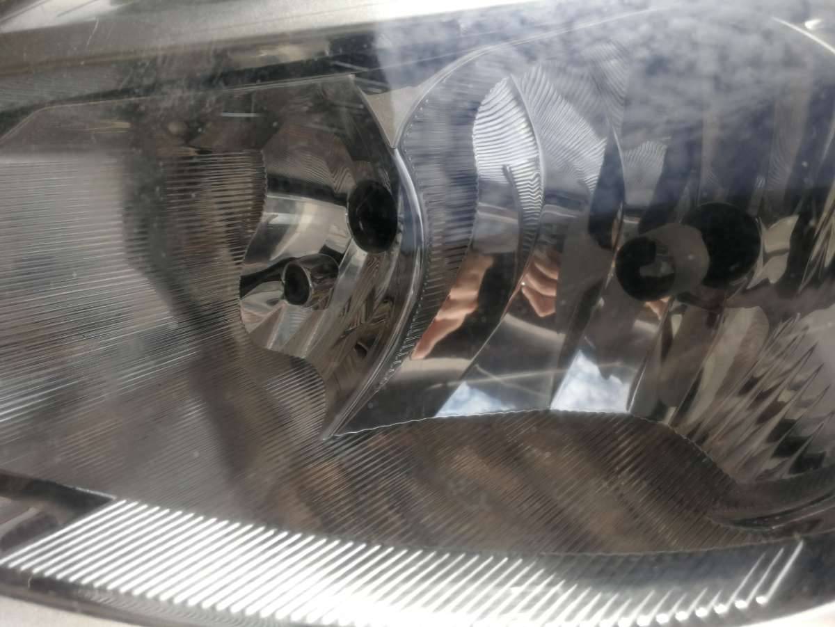 фара левая Renault Clio 3 поколение 2008 - фото №1