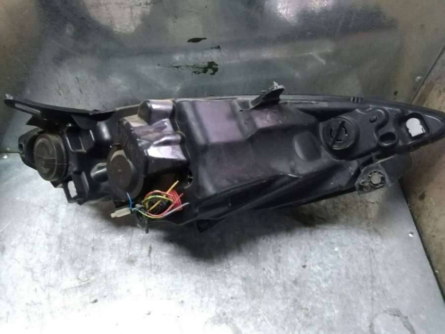 фара левая Peugeot 1007 1 поколение 2007, 1.6 л., бензин, хетчбэк 5 дв. - фото №1