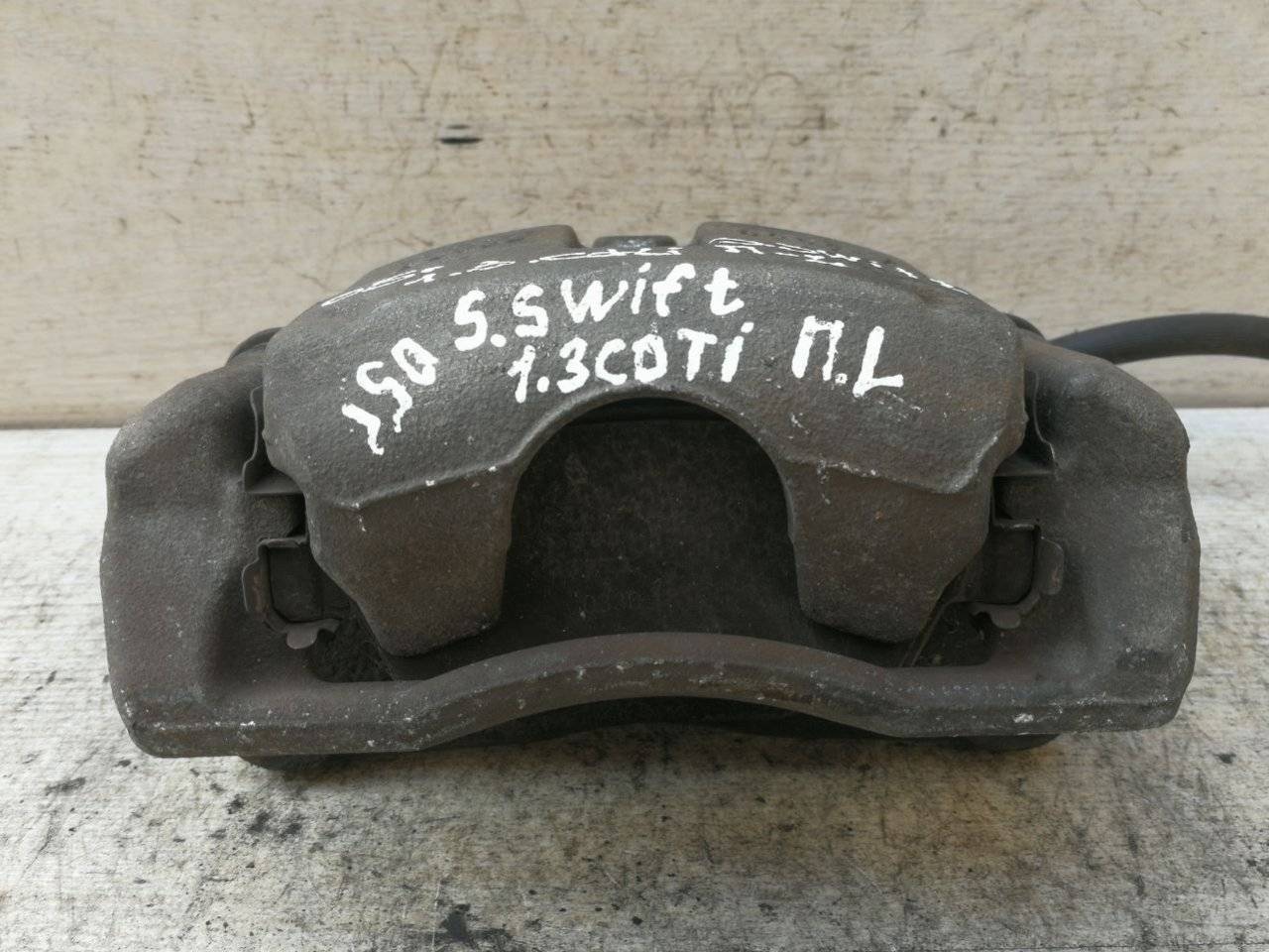 суппорт передний левый Suzuki Swift 3 поколение 2005 - фото №1