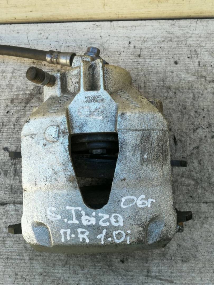 суппорт передний правый SEAT Ibiza 3 поколение 2006 - фото №1