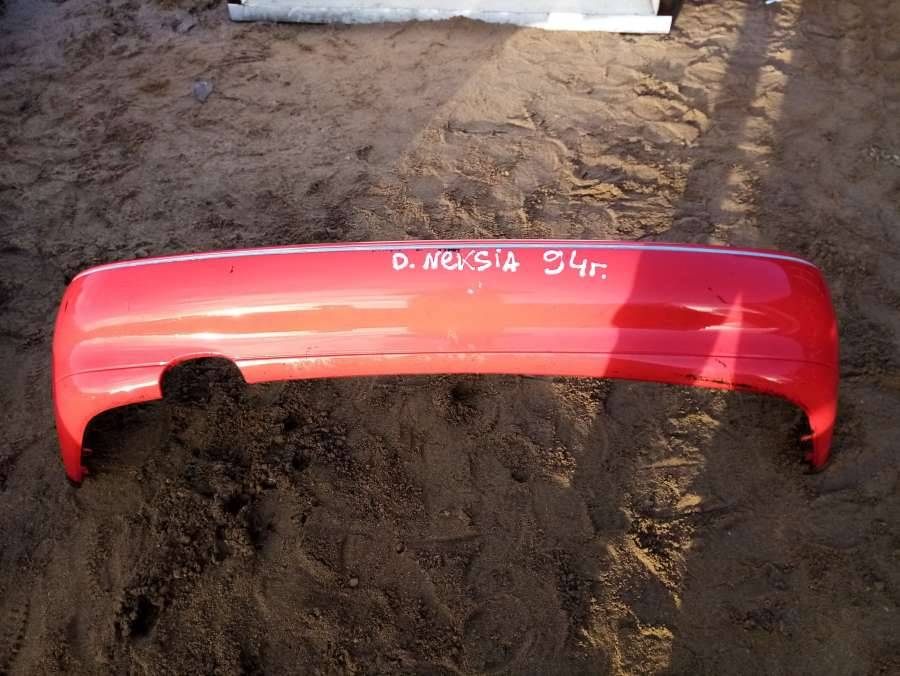 бампер задний Daewoo Nexia 1 поколение 1998, 1.5 л., бензин, хетчбэк 5 дв. - фото №1