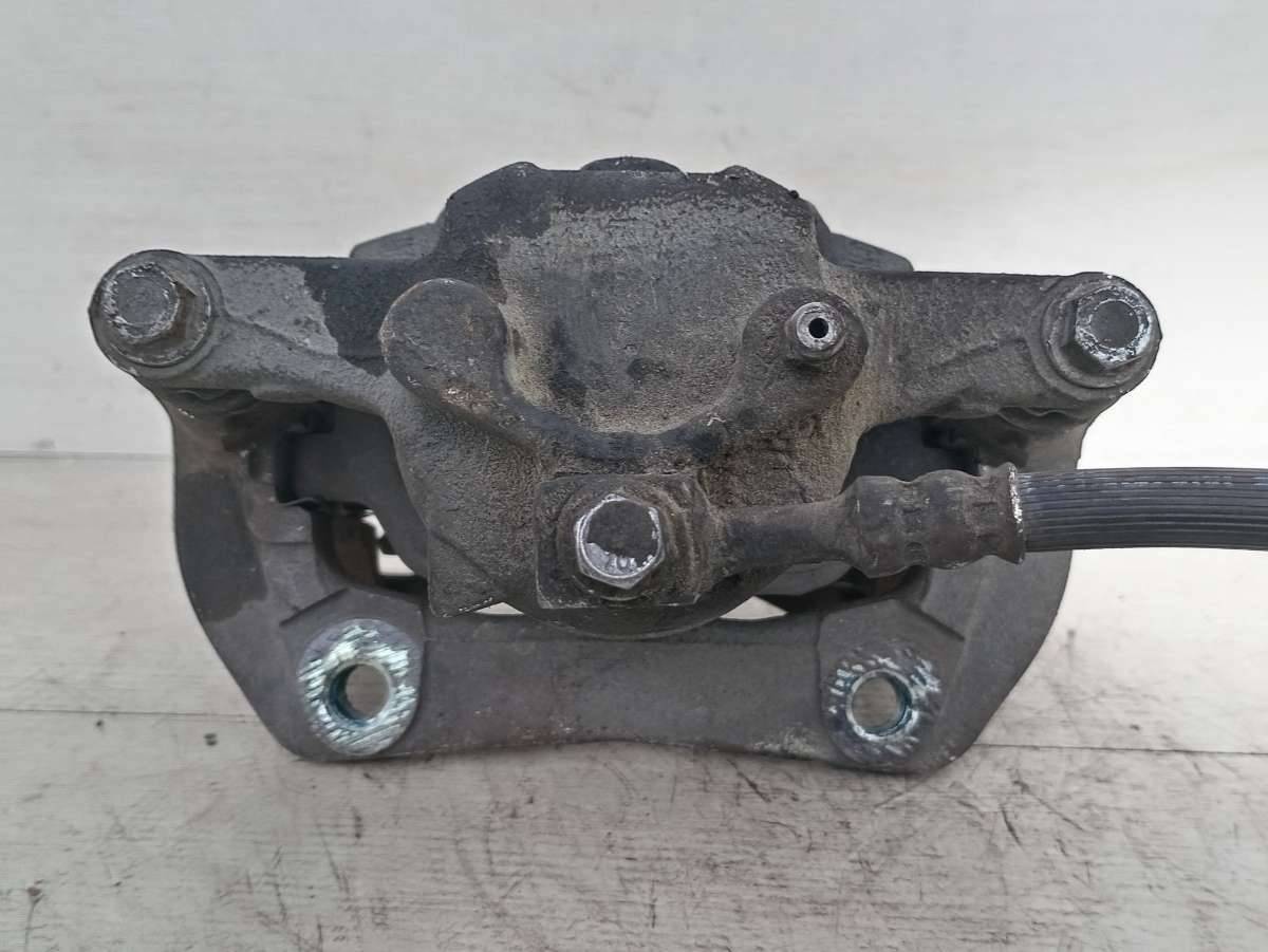 суппорт передний правый Opel Tigra 2 поколение 2007 - фото №1