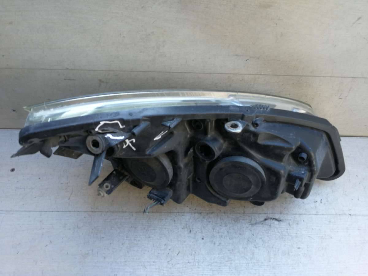 фара левая Renault Scenic 2 поколение 2005 - фото №1