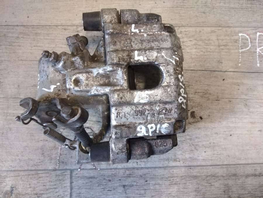 суппорт задний левый Toyota Yaris 3 поколение XP150 2015, 1.4 л., дизель, хетчбэк 5 дв. - фото №1