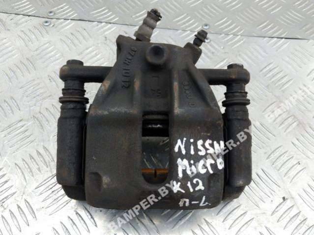 суппорт передний левый Nissan Micra 3 поколение (K12) 2005 - фото №1