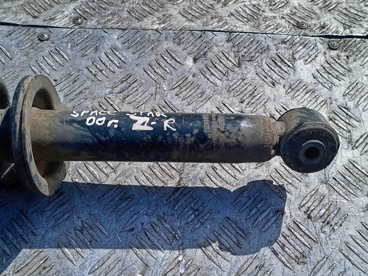 стойка амортизатора Mitsubishi Space Star 1 поколение 2000 - фото №1