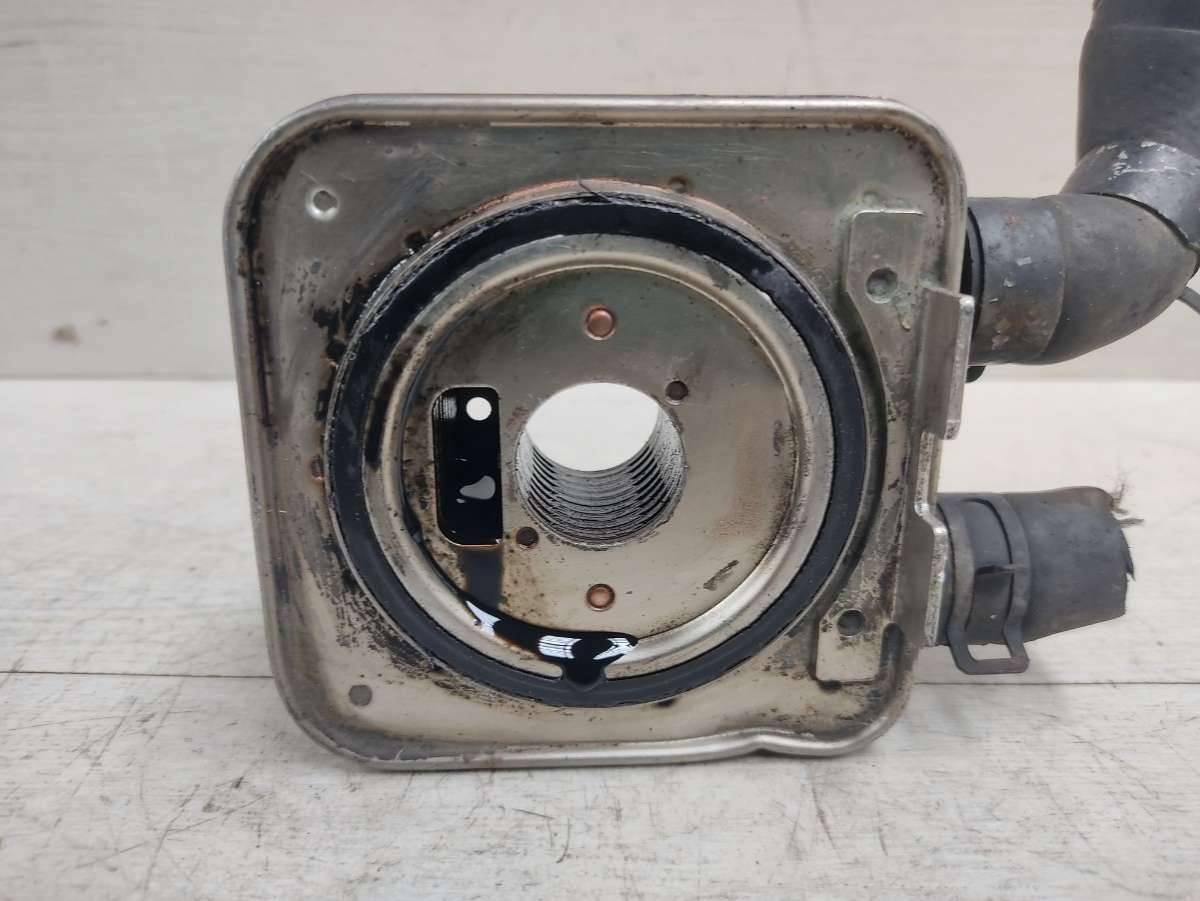 теплообменник масляного фильтра Chevrolet Lacetti 1 поколение 2004, 2.0 л., TDi, дизель - фото №1