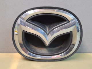 эмблема Mazda 6 3 поколение [рестайлинг] GJ 2016, 2.5 л., PYY1, бензин, АКПП, серый /42а, седан, передний привод, GHP950716
