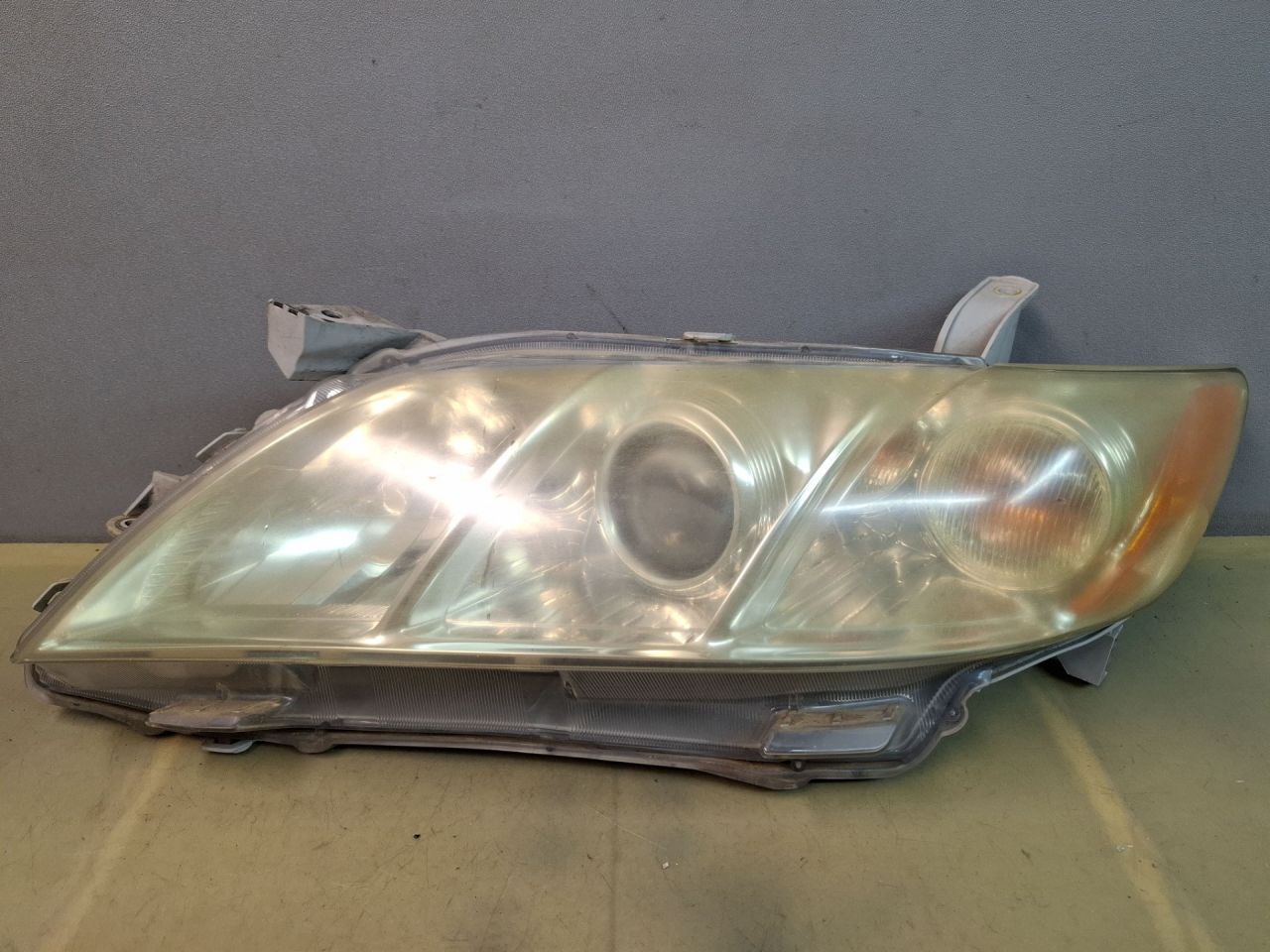 фара левая Toyota Camry 7 поколение XV40 ACV40 2009, 2.4 л., 2AZ-FE, бензин, АКПП, синий, седан, передний привод - фото №1