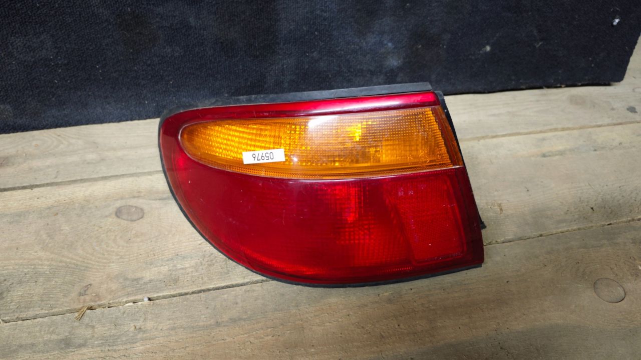 фонарь задний левый Mazda Xedos 9 1 поколение 1996 - фото №1