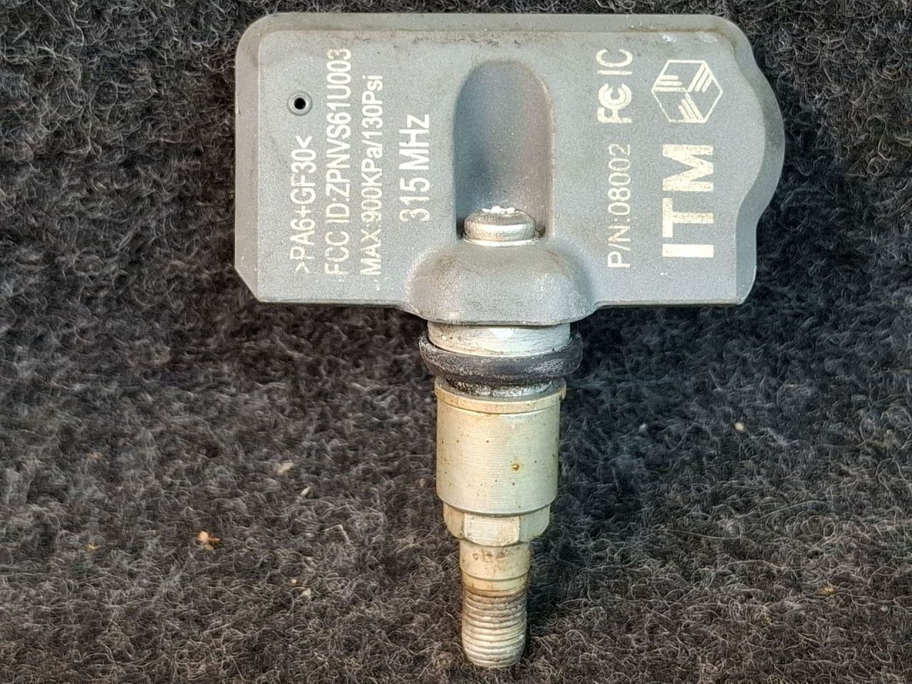 датчик давления в шине Toyota Sienna 3 поколение 2011, 3.5 л., 2GR-FE, бензин, АКПП, серый, передний привод, ZPNVS61U003 - фото №1