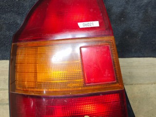 фонарь задний левый Mazda 323 BA [рестайлинг] 1997, хетчбэк 3 дв.