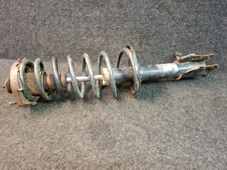 амортизатор задний левый Mazda 323F BJ 2000, 2.0 л., RF3F, дизель, МКПП, хетчбэк 5 дв., передний привод