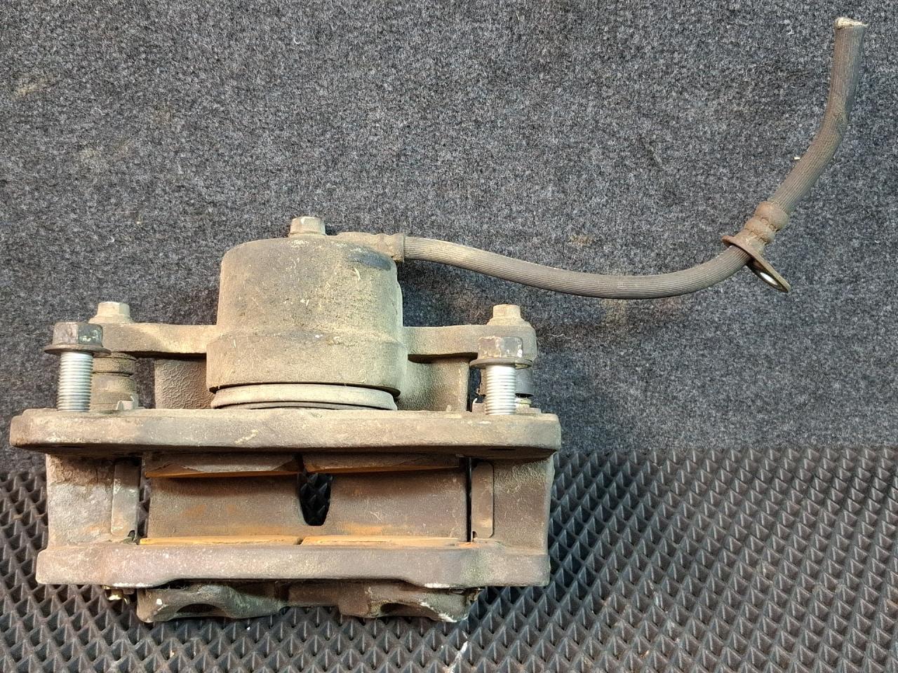 суппорт передний левый Toyota Camry 7 поколение XV40 2009, 3.5 л., 2GR-FE, бензин, передний привод - фото №1