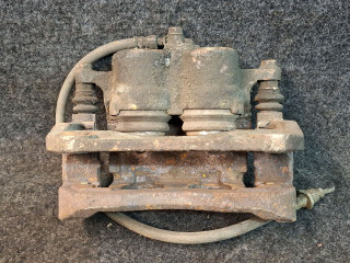 суппорт передний левый Toyota Sienna 3 поколение 2011, 3.5 л., 2GR-FE, бензин, АКПП, серый, передний привод