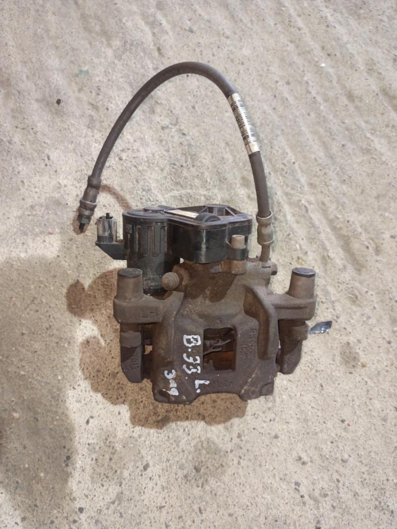 суппорт задний левый Ford Escape 4 поколение CX482 2020, 2.0 л., бензин, АКПП, белый az, внедорожник 5 дв., полный привод - фото №1