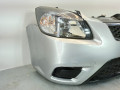 передняя часть (ноускат) Kia Rio 2 поколение [рестайлинг] 2010, 1.5 л., CRDi, дизель, 5МКПП, серебристый, хетчбэк 5 дв., передний привод, правый руль - фото №4
